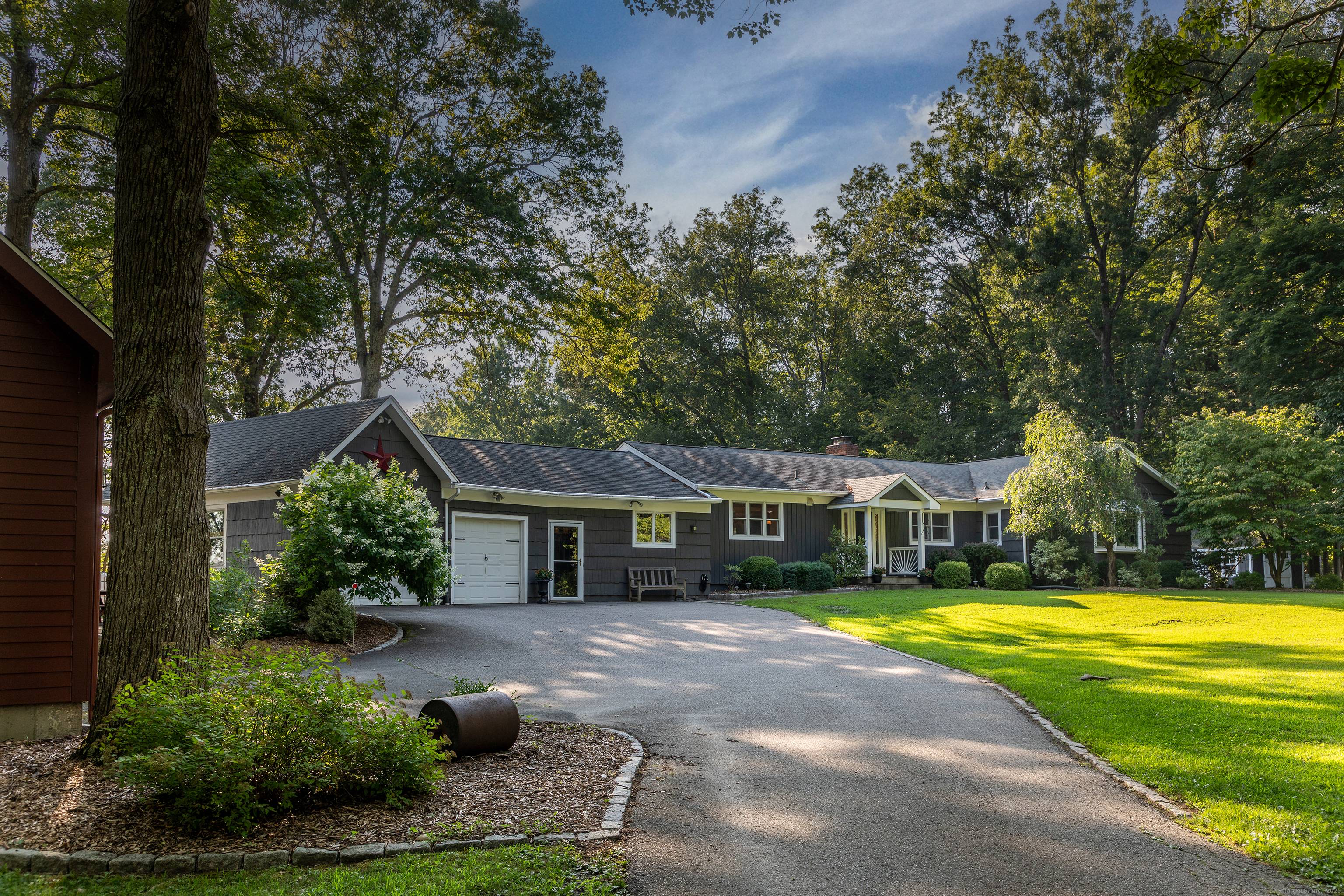 Set along a scenic country road with sweeping views of the western hills, this beautifully renovated ranch offers the rare ease of single level living and is situated on nearly ...