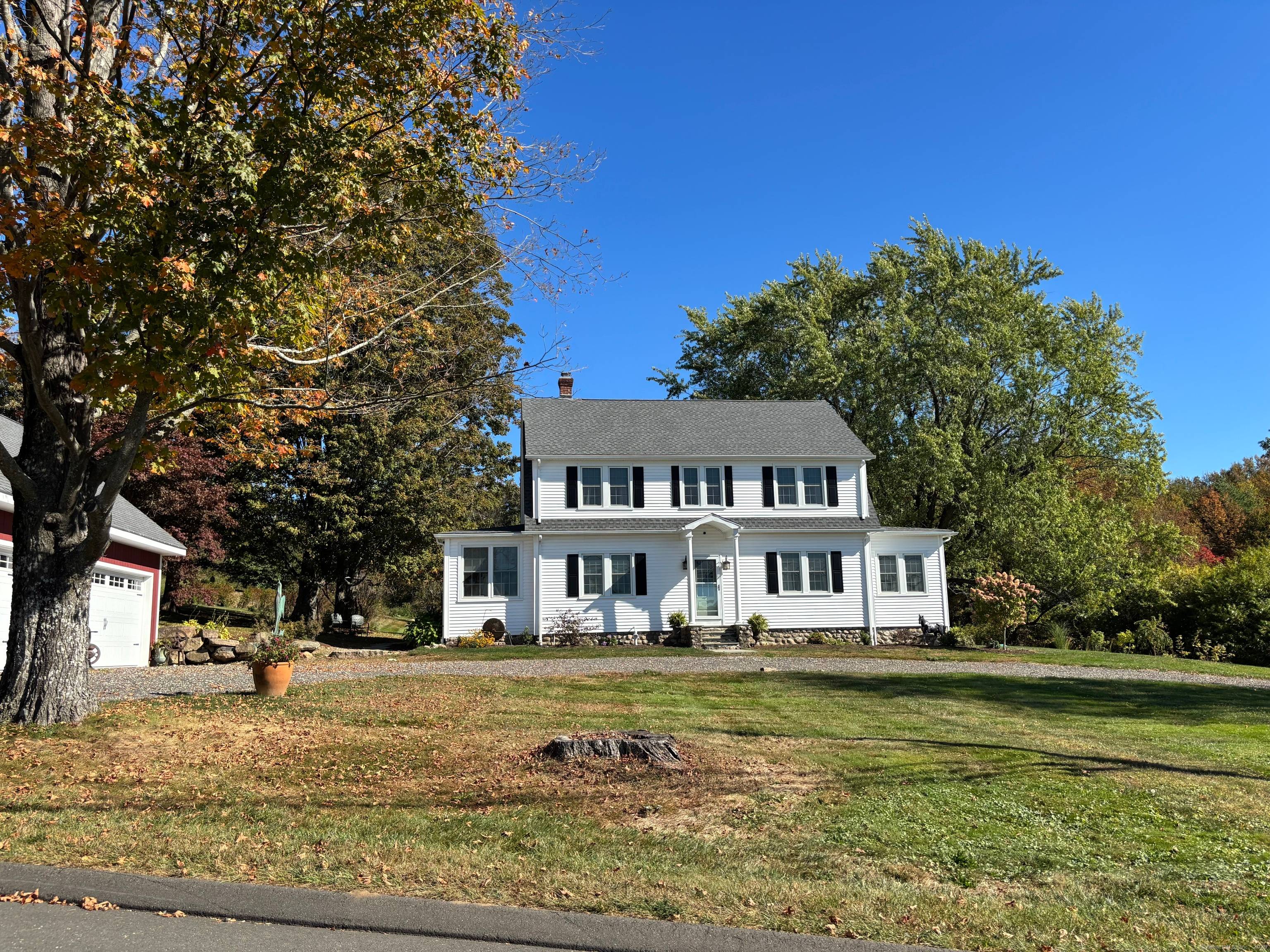 Truly a one of a kind property, this timeless 1929 New England home has been thoughtfully remodeled just three years ago, blending classic character with modern comfort.