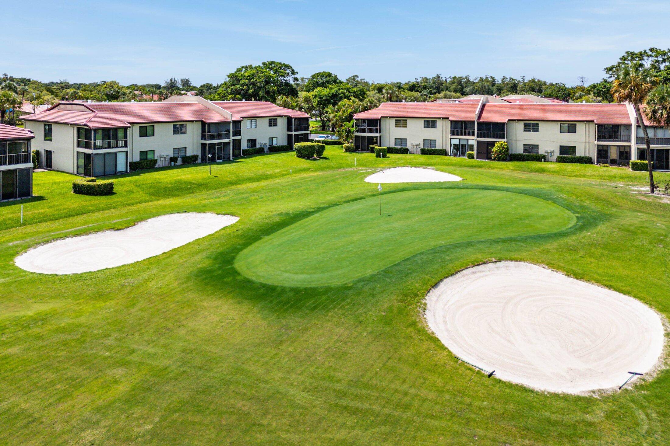 You are going to fall in love with this stunning 2 bedroom, 2 bath condo overlooking the Boca Lago golf course !