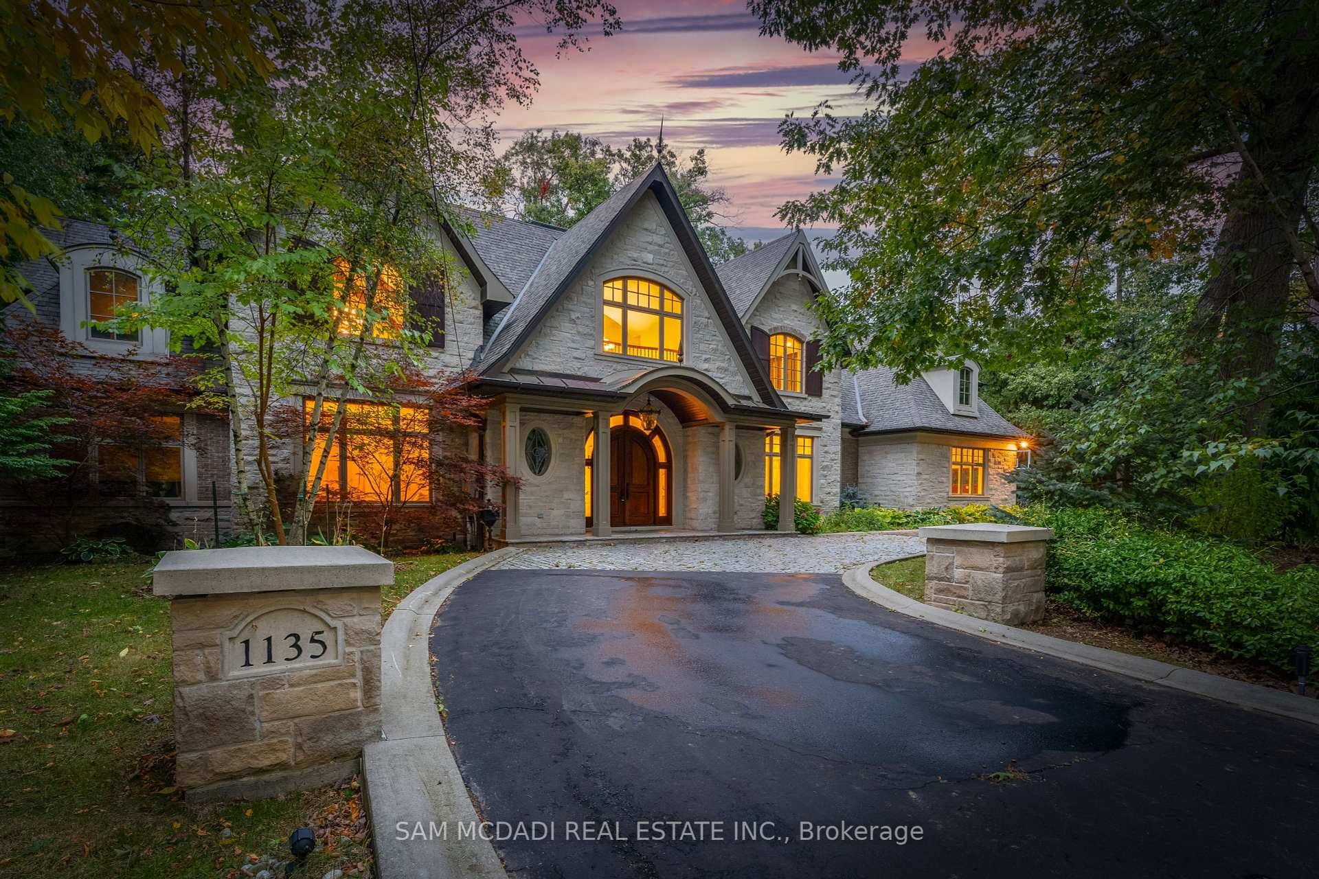 Welcome to this lovely home set on a 198ft wide lot w ravine views.