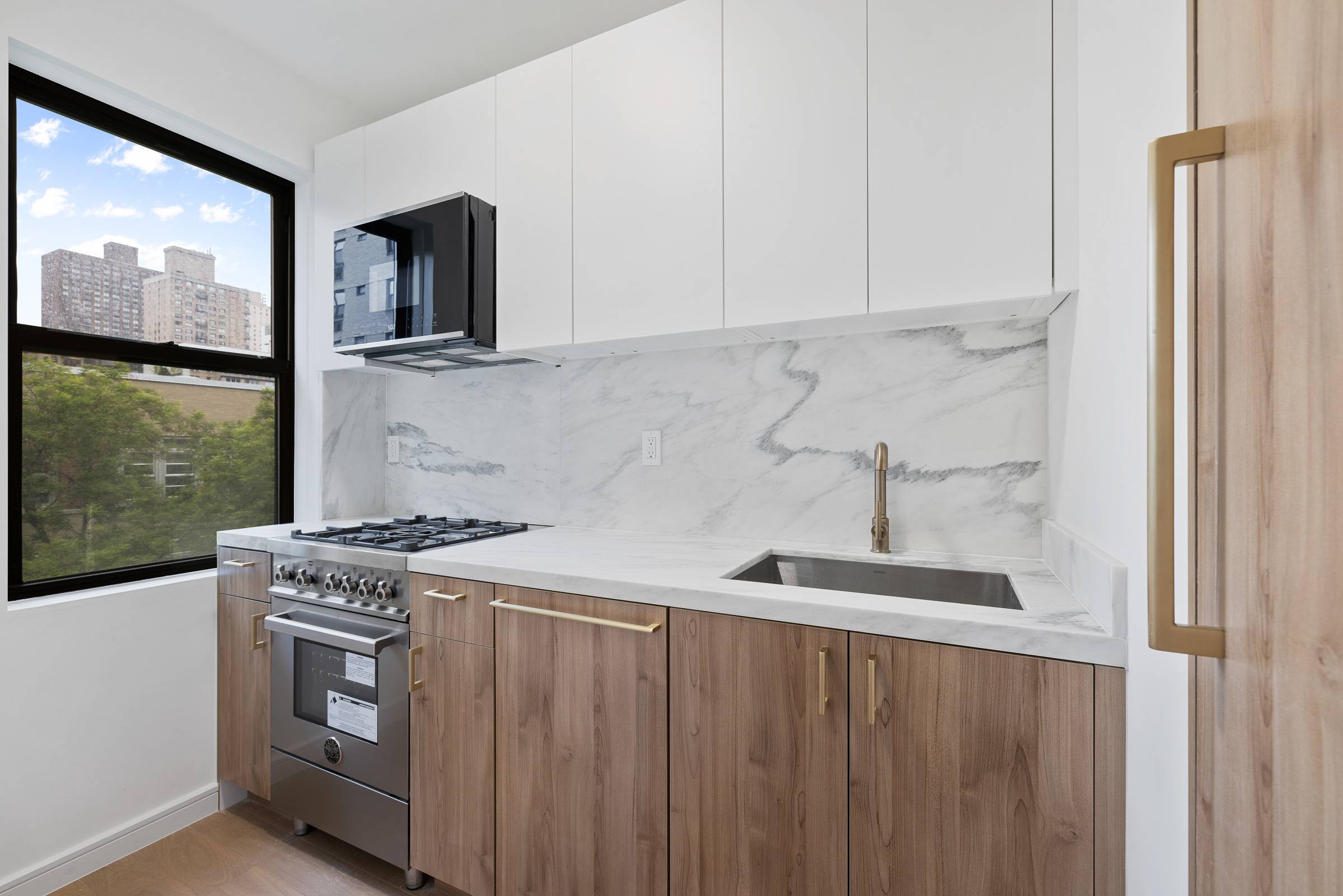 Oversized studio, 1 bathroom, plenty of closet space, featuring modern finishes, custom marble features in bathrooms, chef s kitchens with integrated stainless steel appliances, ample closets, wide oak plank flooring ...