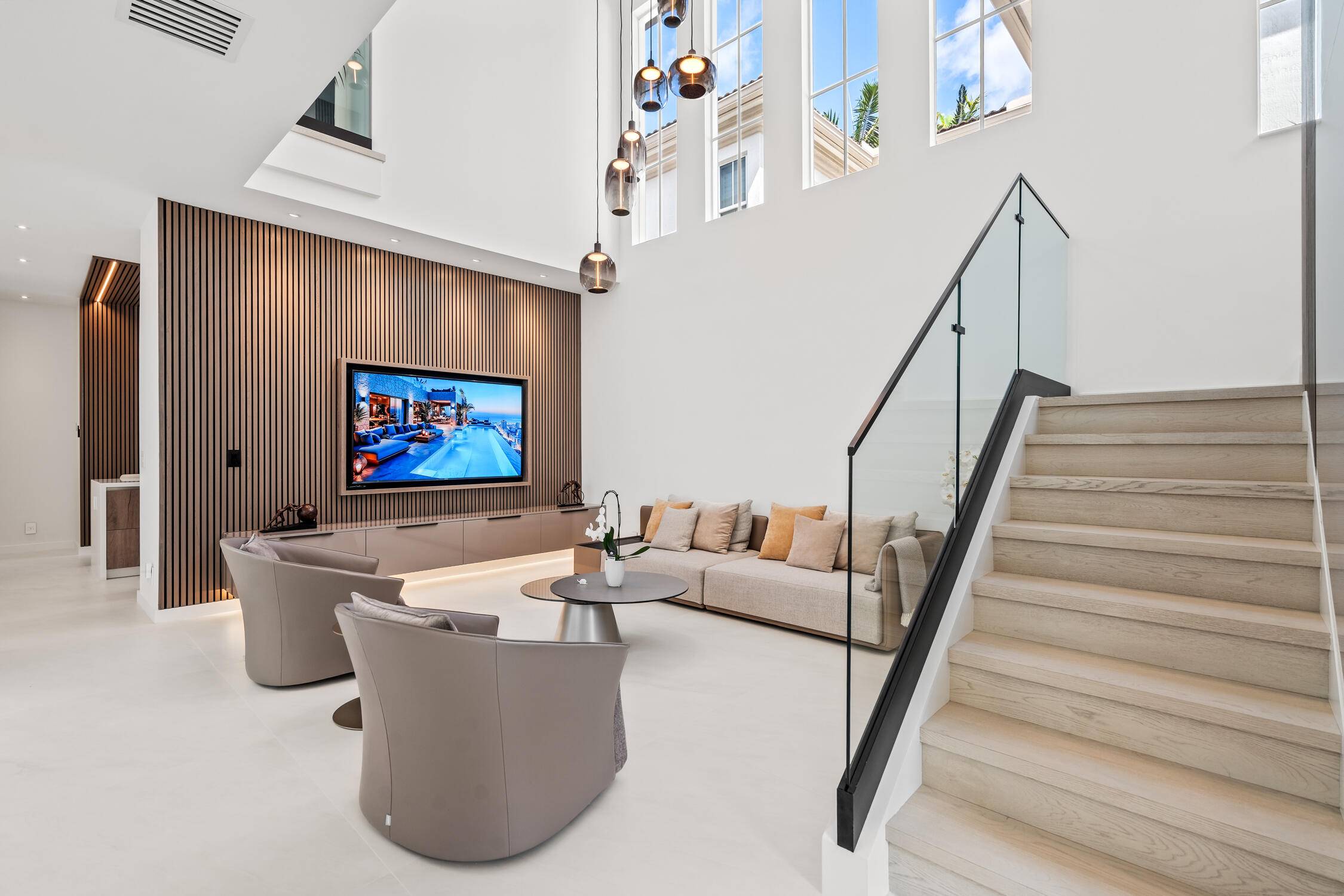 Welcome to a one of a kind, fully renovated luxury residence in the heart of the highly desirable, centrally located Palm Beach Gardens gated community of Evergene.
