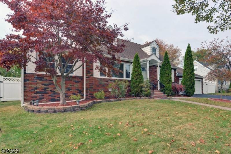 Expanded Cape Cod, move in ready 4Br, 2 BA in the desirable Echo Glen neighborhood.