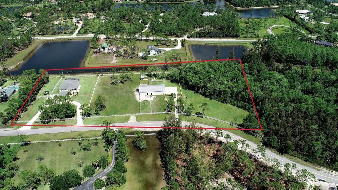 6688 Duckweed Road, Lake Worth, Florida 33449 In The Prestigious Equestrian, Guard Gated Community Of Homeland, Renowned For Its Secluded Charm, Is Set On More Than Five Sprawling Lakefront Acres ...