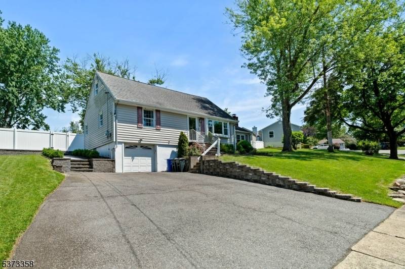Welcome to 12 Kingston Road a charming 4 bedroom, 2 bath Cape Cod that offers timeless appeal, a flexible layout, and a backyard built for entertaining.