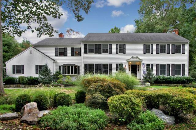 Spacious, furnished 5 Bedroom 3 full 2 half bath colonial located on a tranquil lot on a highly desirable Long Lots cul de sac.