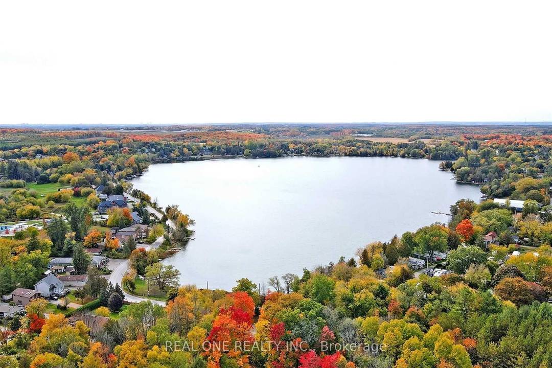 Beautifully Fully Professional Renovated Custom Built Bungalow With Direct Westerly Lake Views.