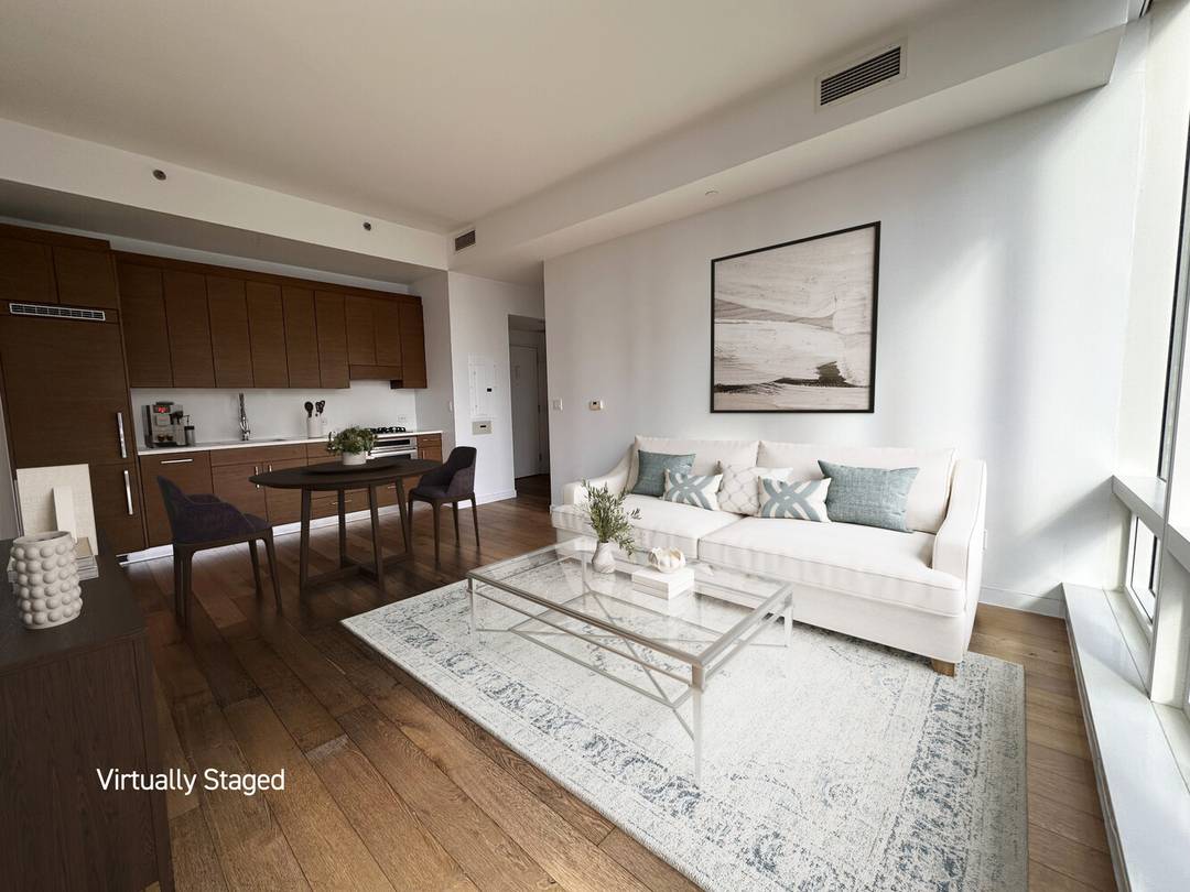 Perched on the 21st floor, this elegant one bedroom condominium offers stunning eastern and southern exposures providing breathtaking views of the New York City skyline through floor to ceiling windows ...