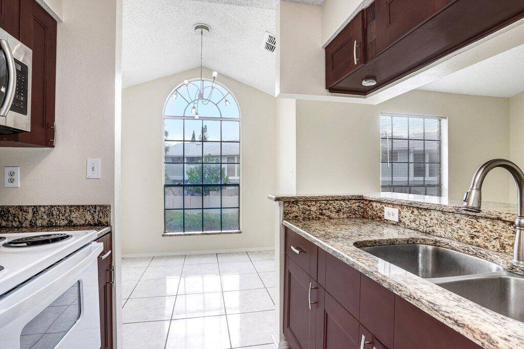 Come Home to this 1 Bedroom 2nd Floor Condominium in The Grand Reserve Gated Community.