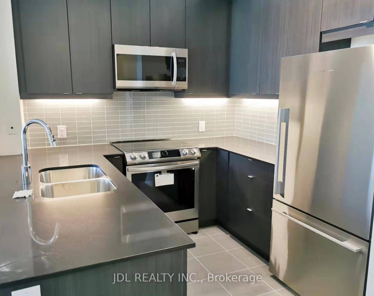 Welcome to this Spacious 2 1 bedroom, 2 full bathroom condo located in the heart of Etobicoke !