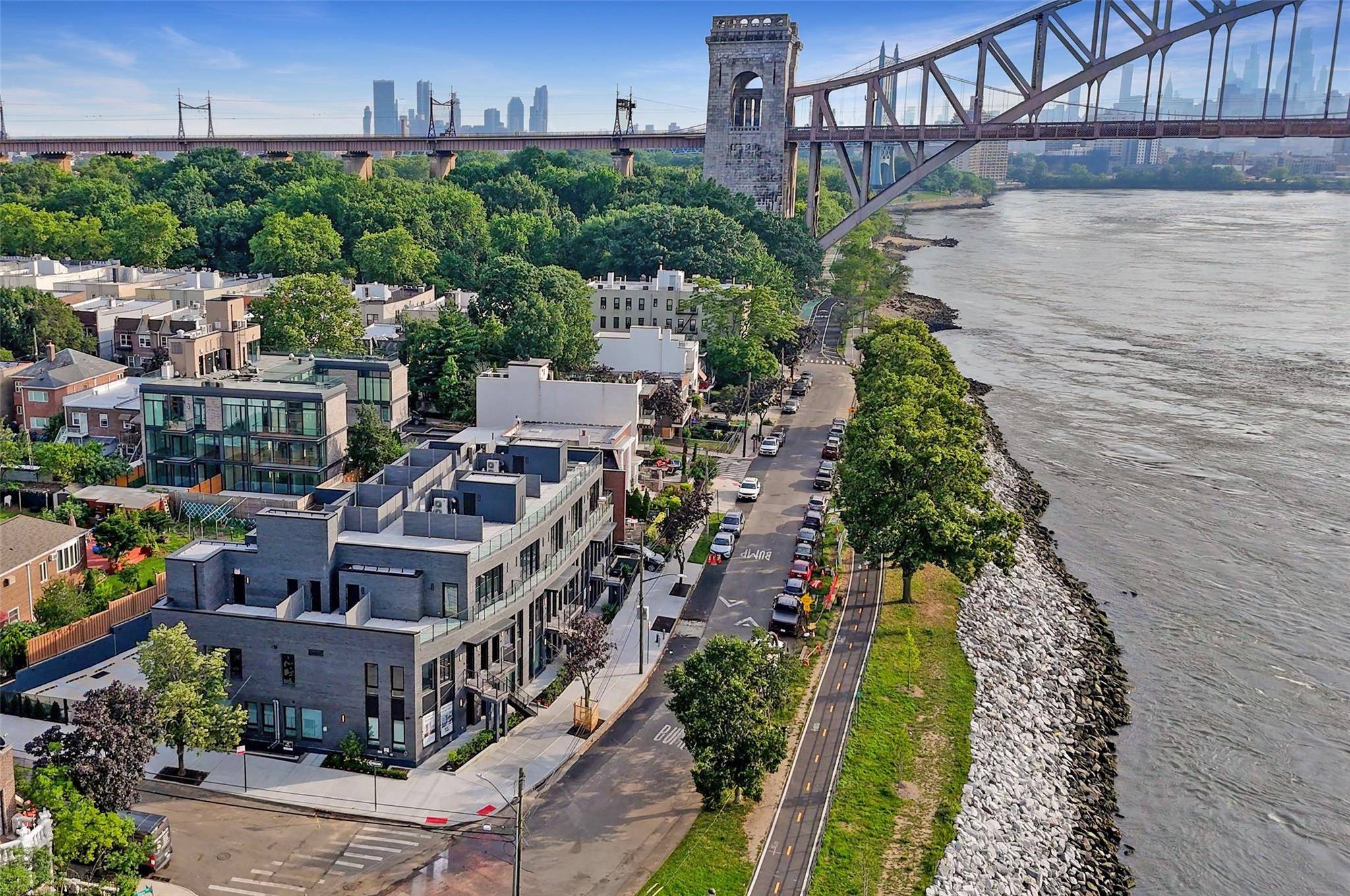 Welcome to Apartment 2D at The Aristo, a luxurious townhome style residence with its own private entrance and captivating riverfront views.