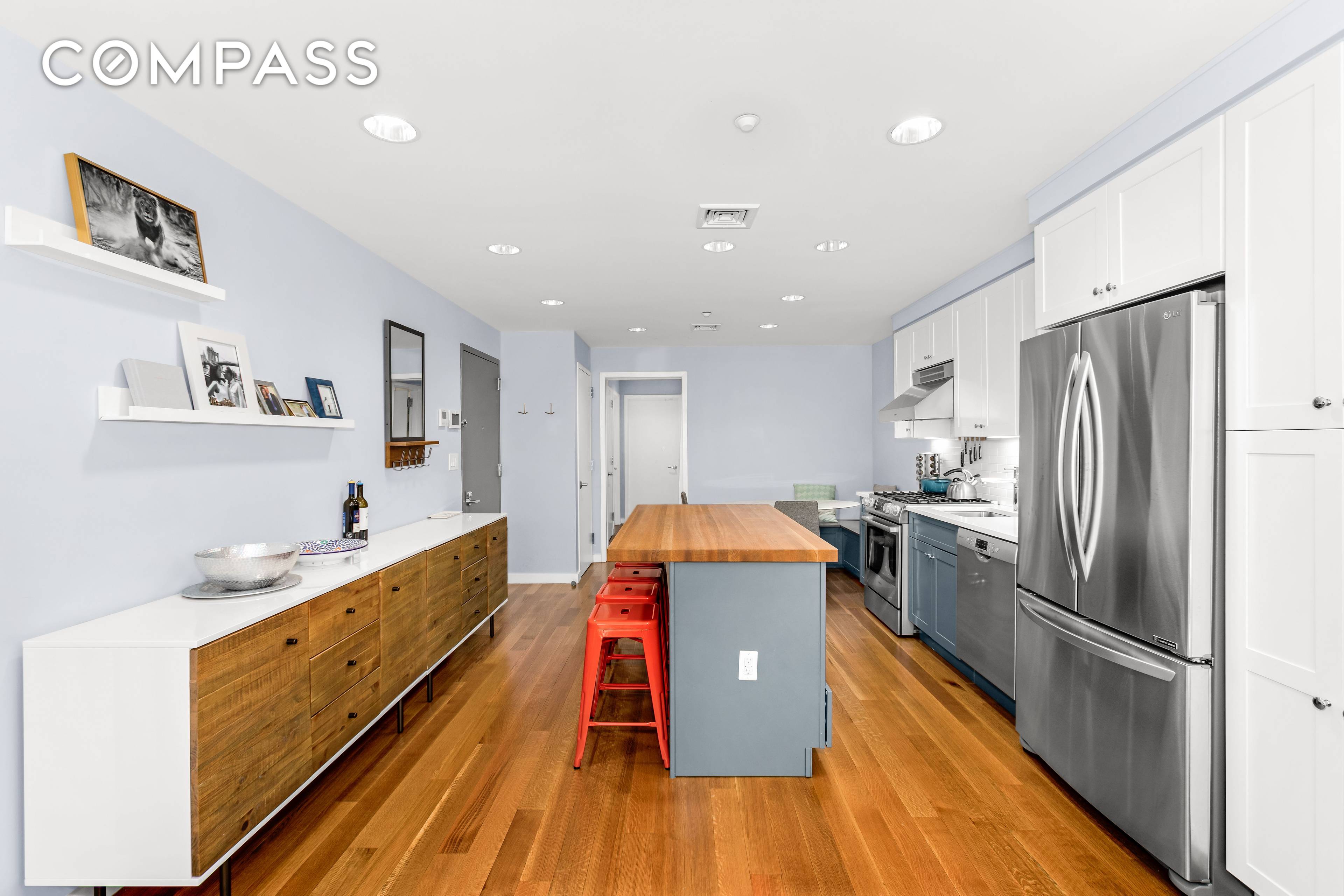 Residence 2E at 324 Twenty is a spacious three bedroom, two bathroom home spanning approximately 1, 255 square feet.