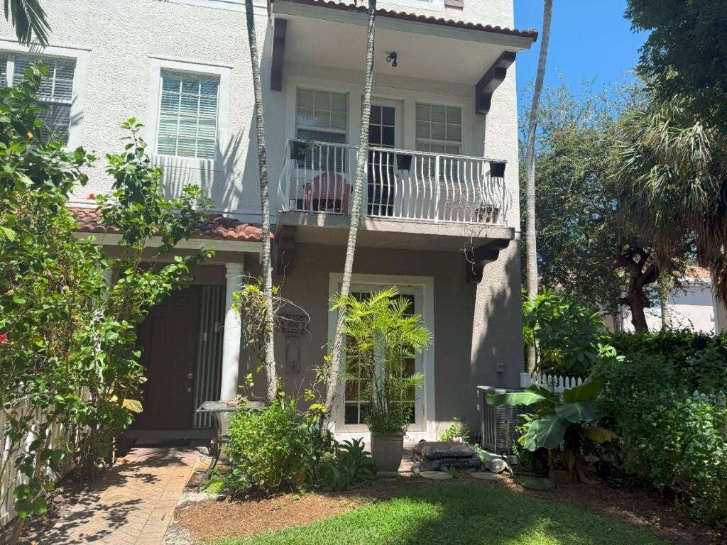 Three Story Townhouse with 2 car garage.