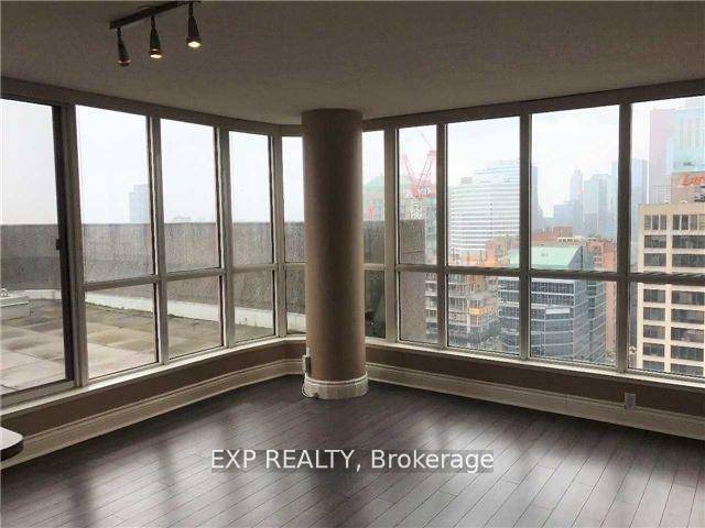 Absolute Well Kept ! Spacious Corner Unit with Laminate Flooring Throughout and Wrap Around Decked Terrace.
