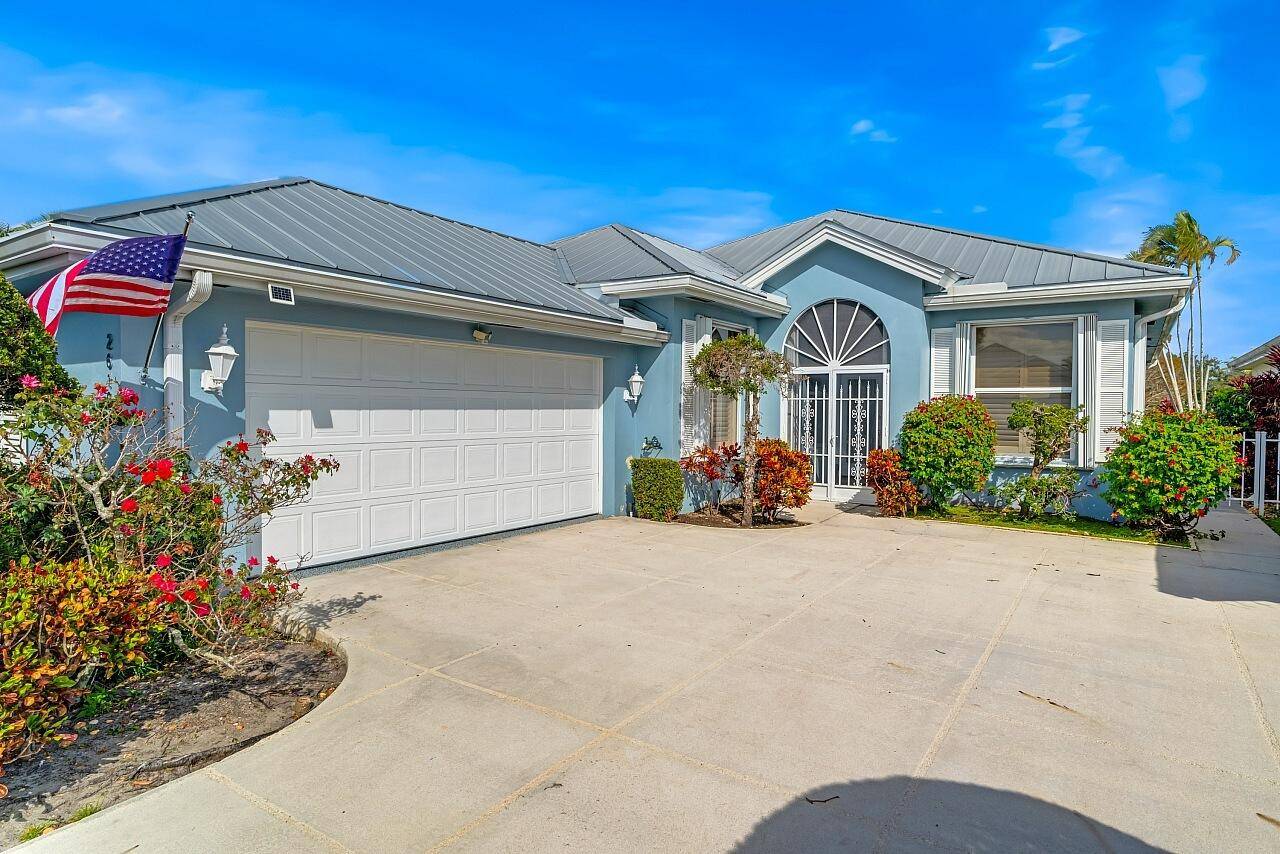 Absolutely Beautiful stylish LAKEFRONT Divosta built home.