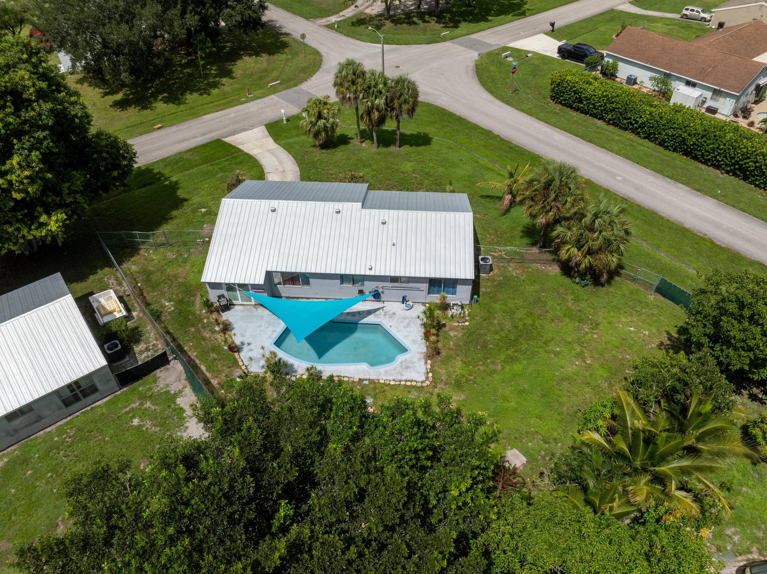 Welcome to an affordable 3 bedroom plus a den office 2 bathroom pool home.