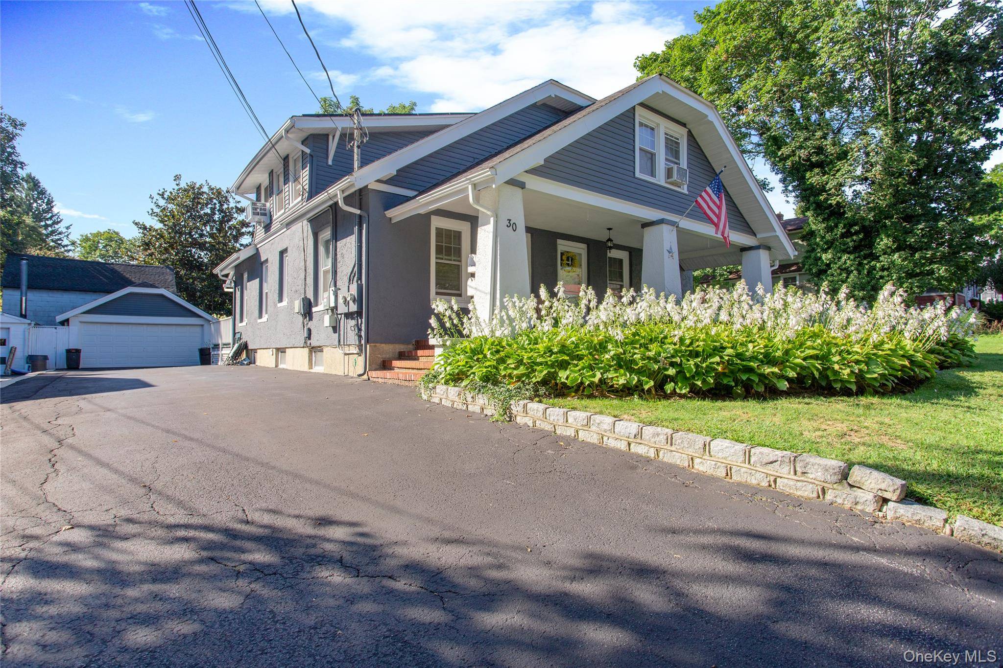Location, Location ! Spacious, Charming first floor apartment in the heart of the village !