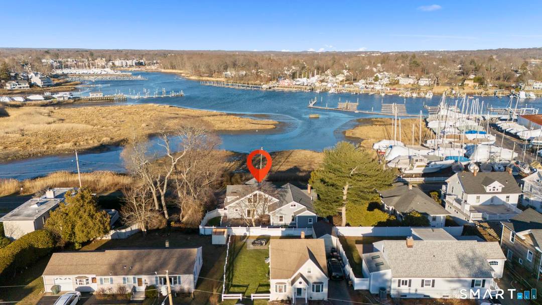 Set in one of Milford's most coveted locations, Fort Trumbull Beach, this exceptional home offers the rare combination of walkability to downtown direct harbor water views.