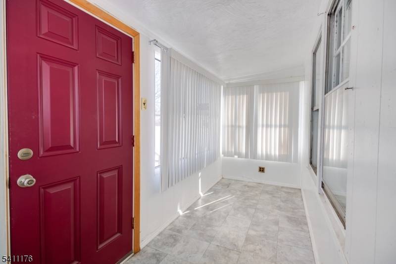 This 3 bedroom Colonial offers a practical layout and multiple bonus spaces that add flexibility.