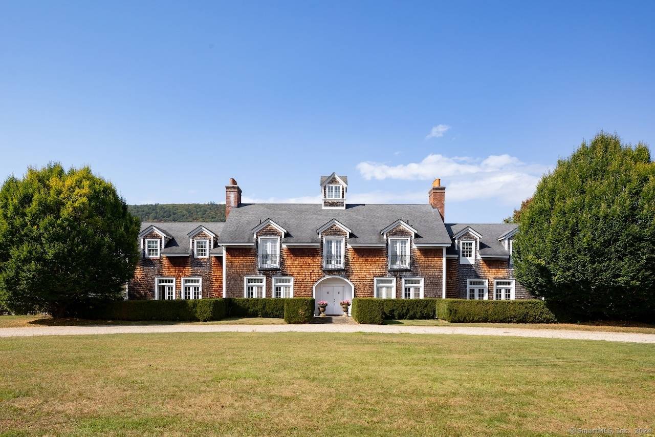 Clarion Farm is an iconic French Country Estate Horse Property in Salisbury, CT.