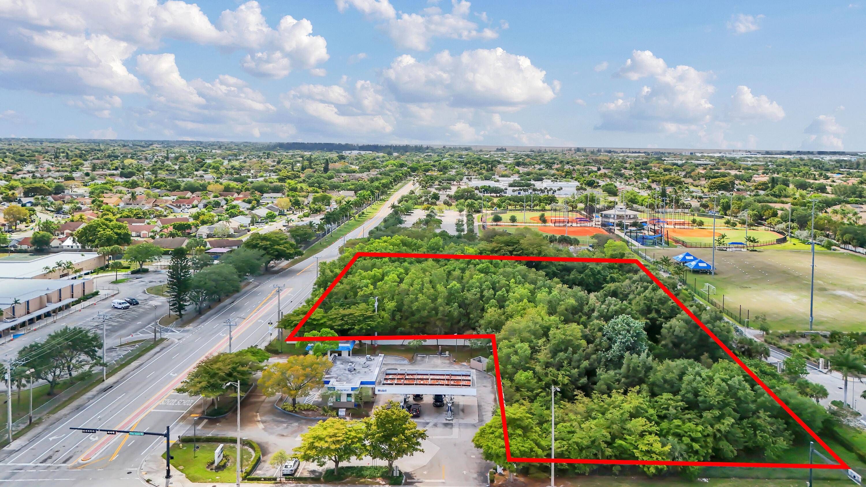 Rare 2. 77 8209 ; acre infill commercial site at the signalized corner of Pine Island Road and NW 50th Street in Sunrise, FL.