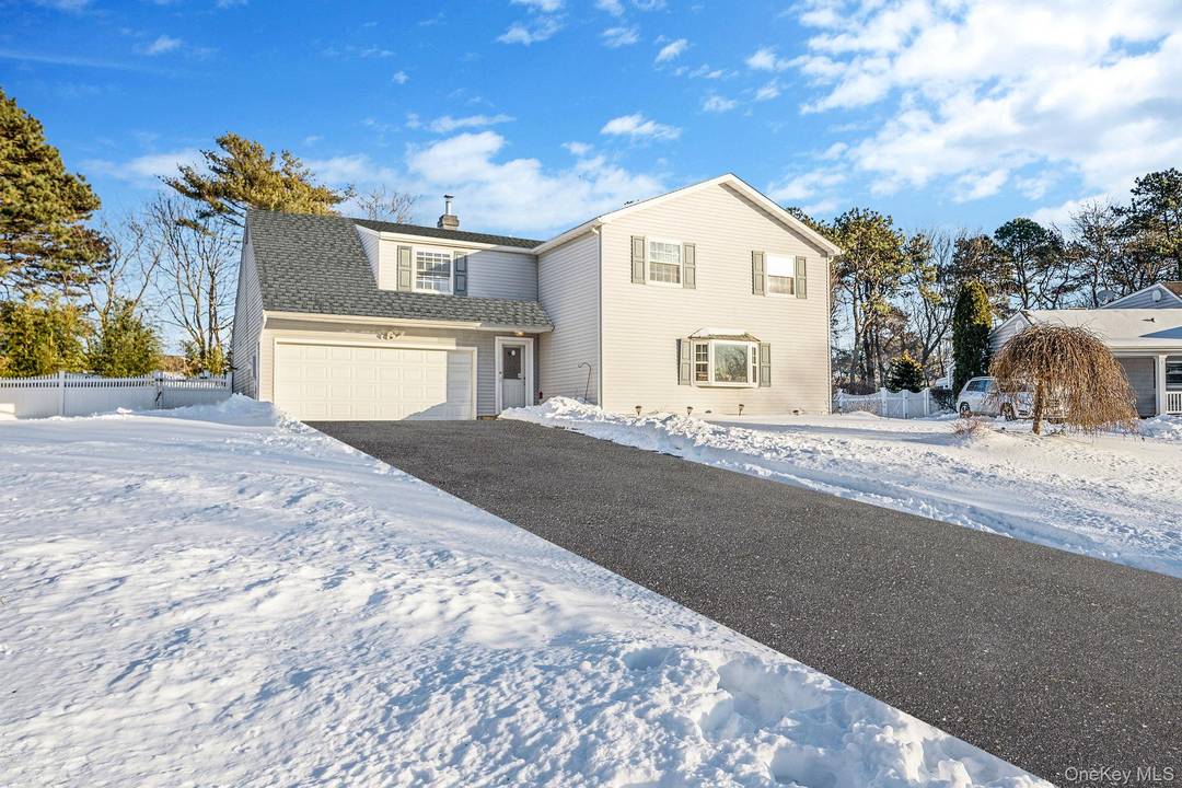 Welcome to 9 Norway Pine Drive, Medford, a spacious and well maintained 6 bedroom, 2.