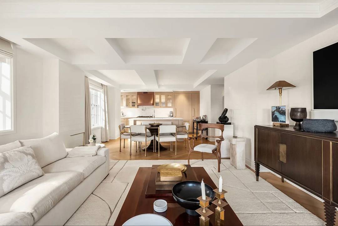 High above Central Park, this exquisite two bedroom, two bathroom residence offers panoramic, postcard perfect views that sweep across the park and stretch toward the iconic Midtown Manhattan skyline.