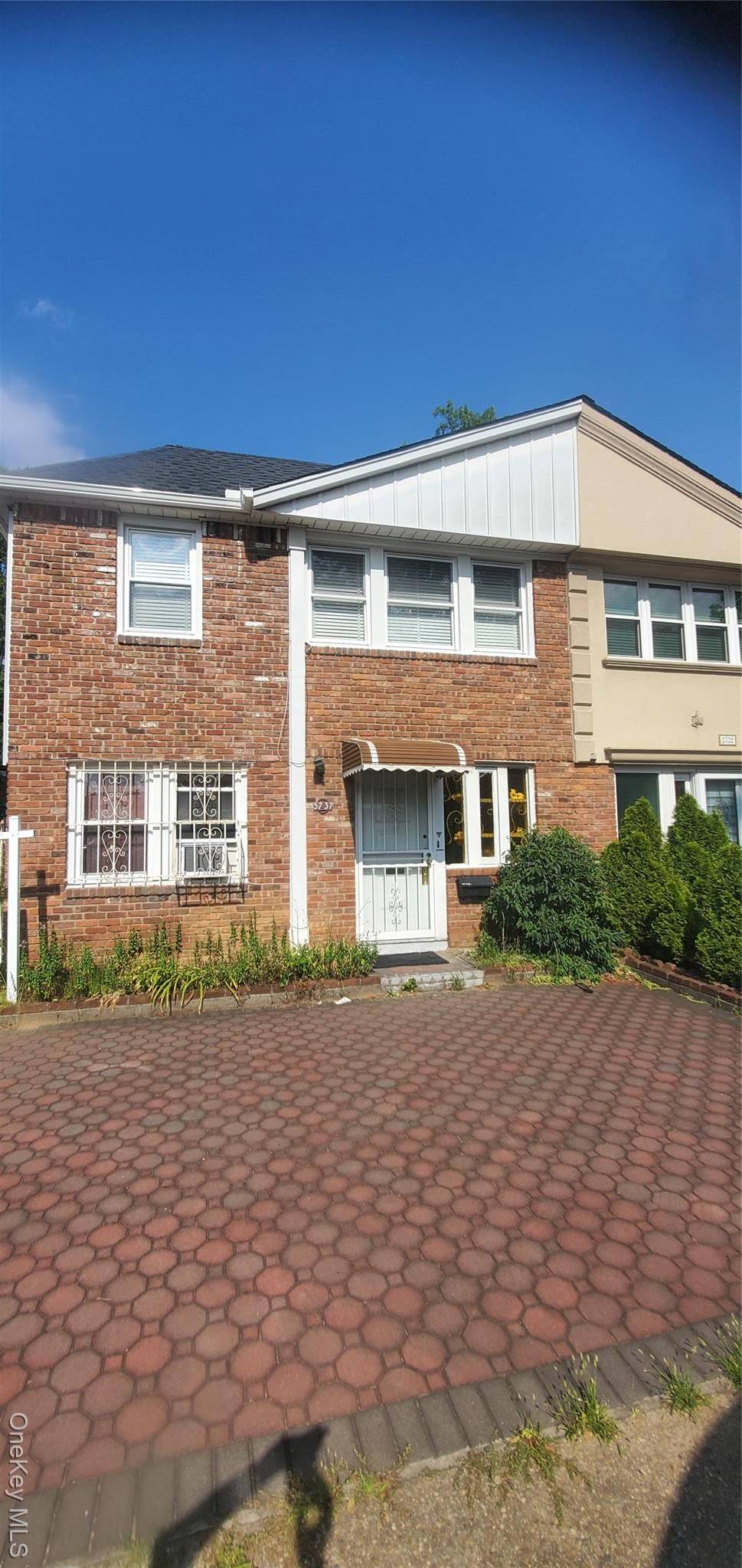 Two family semi detached in the Dynamic neighborhood of Oakland Gardens in Bayside.
