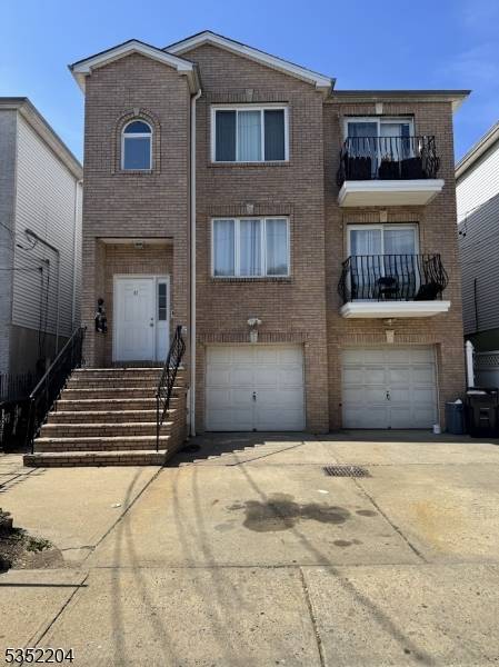 Newer style three unit house in a desirable section of the Ironbound.