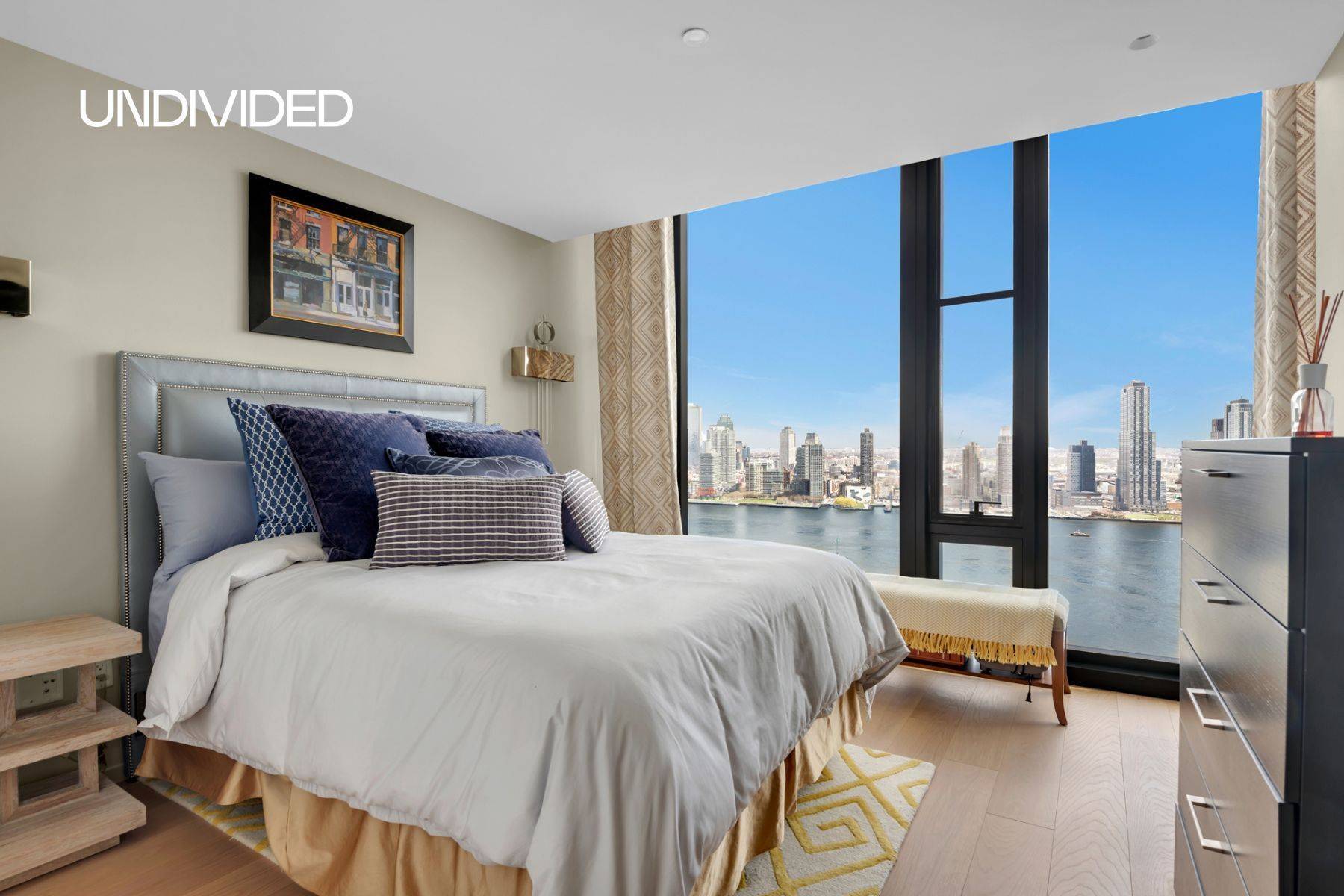 With sweeping Northeast corner exposures and expansive views of the East River, unit 29K at One UN Park is a spacious and top of the line 2BD 2.