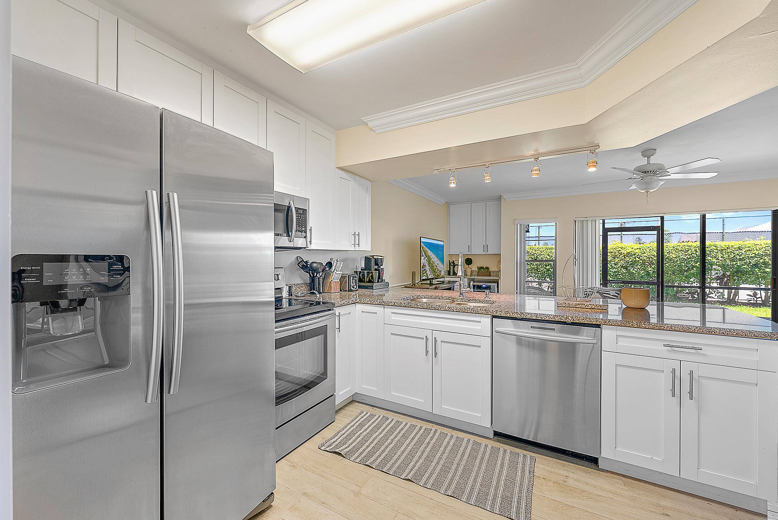 TURNKEY AND FULLY FURNISHED bring your personal items and move right into this beautifully furnished, updated and upgraded, first floor 1 bedroom, 1.