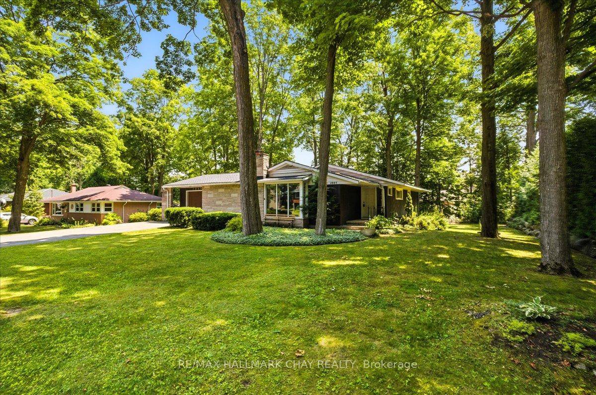 Parkland Setting, This Quaint Bungalow Is Nestled Beneath an Oasis of Well Maintained Trees on the Quietest Street In Town.