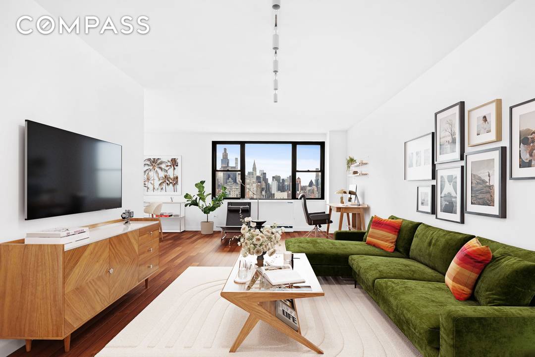 Welcome to this top floor, corner residence at 201 East 17th Street, Apartment 32G, where sweeping north and west exposures fill the home with light and totally unobstructed city vistas ...