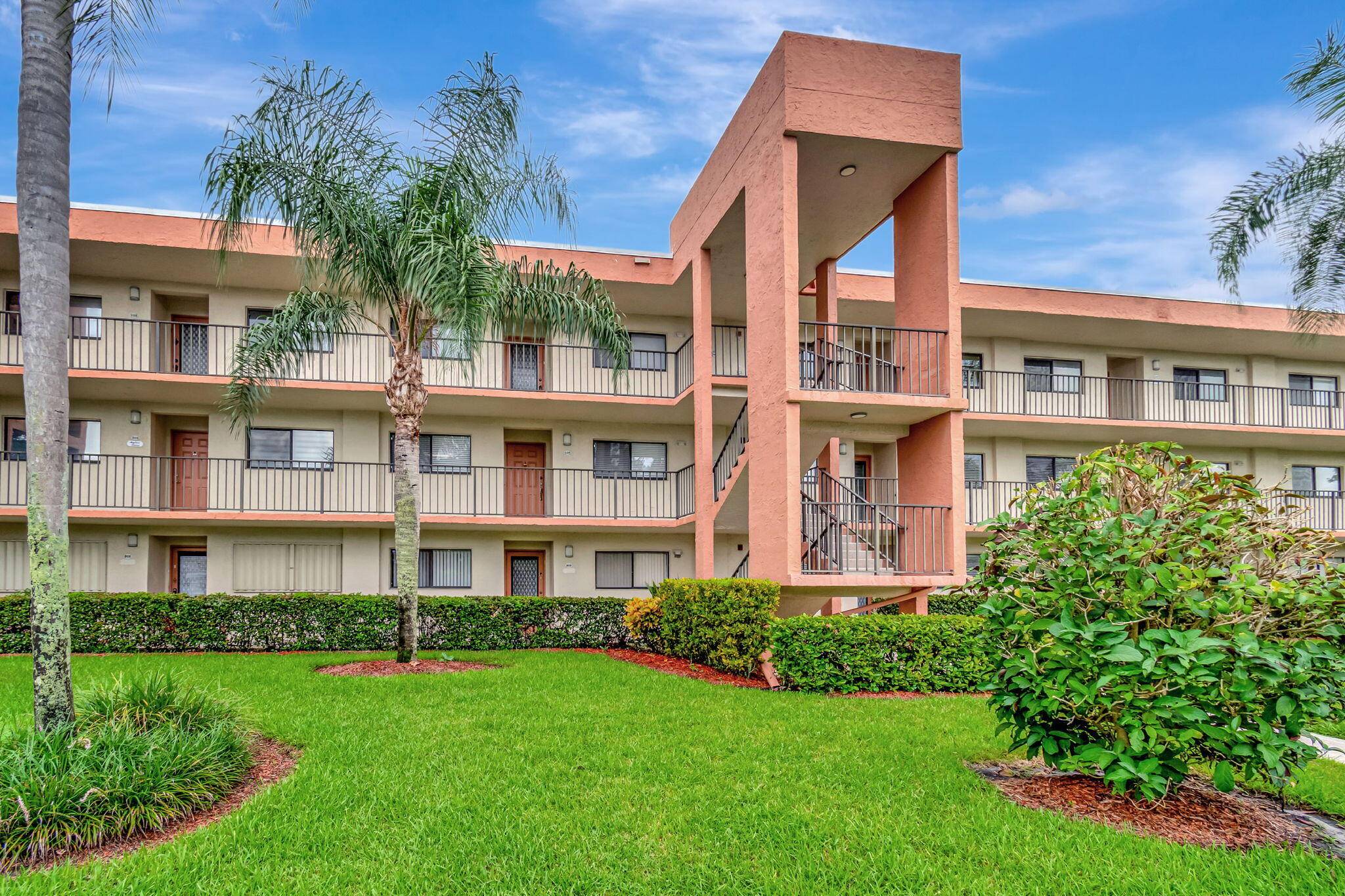 Welcome to 5598 Witney Drive, Delray Beach, FL, a stunning, freshly renovated ground floor condominium offering front row views of an exquisite lake.
