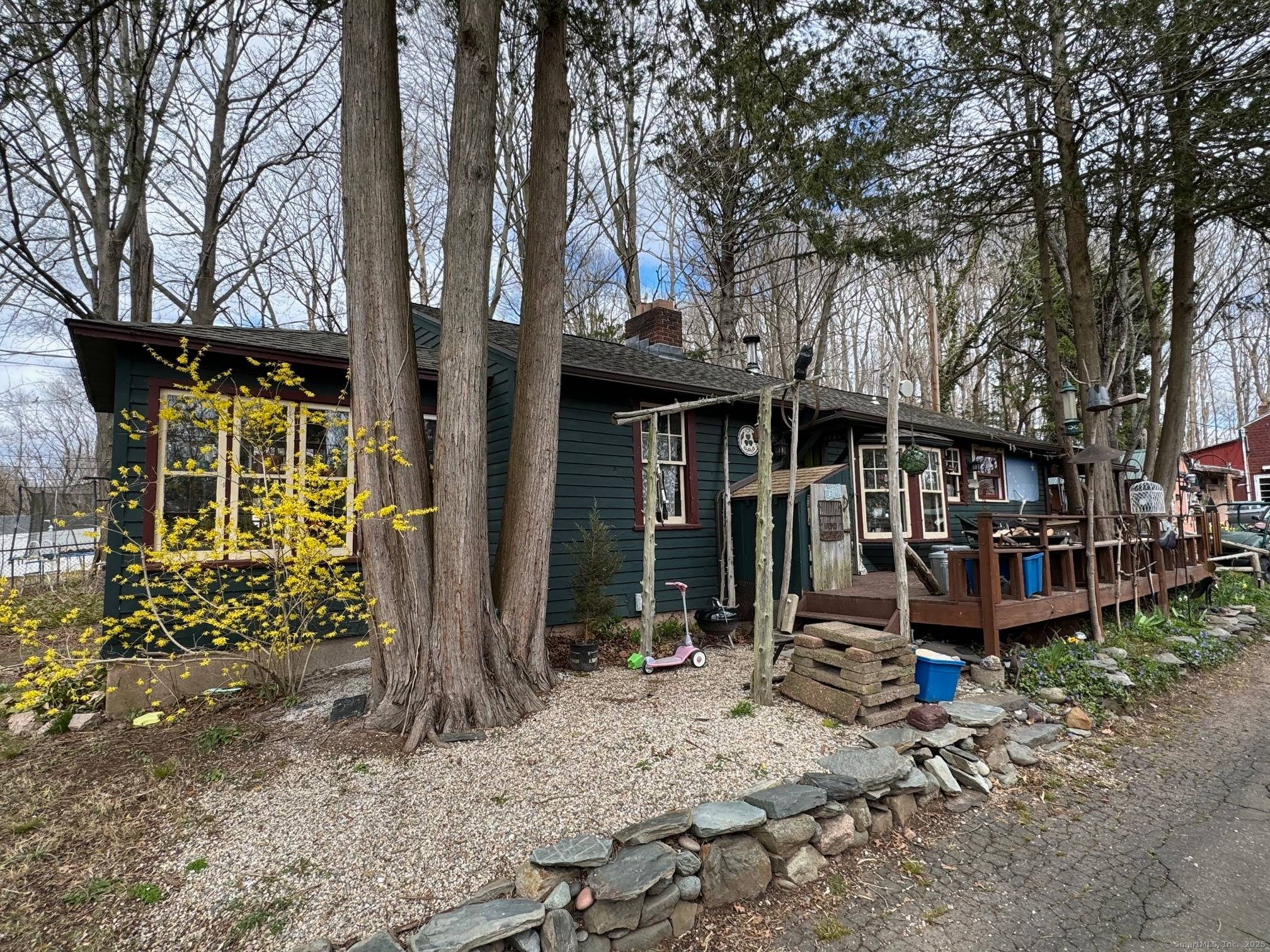 PACKAGE DEAL WITH TWO HOMES ON TWO PARCELS WITH EXTRA LAND.