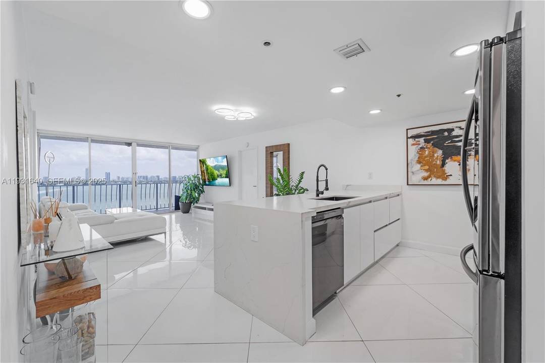 Fully remodeled 2 bedroom, 2 bath residence featuring spectacular, unobstructed bay and marina views in North Bay Village.