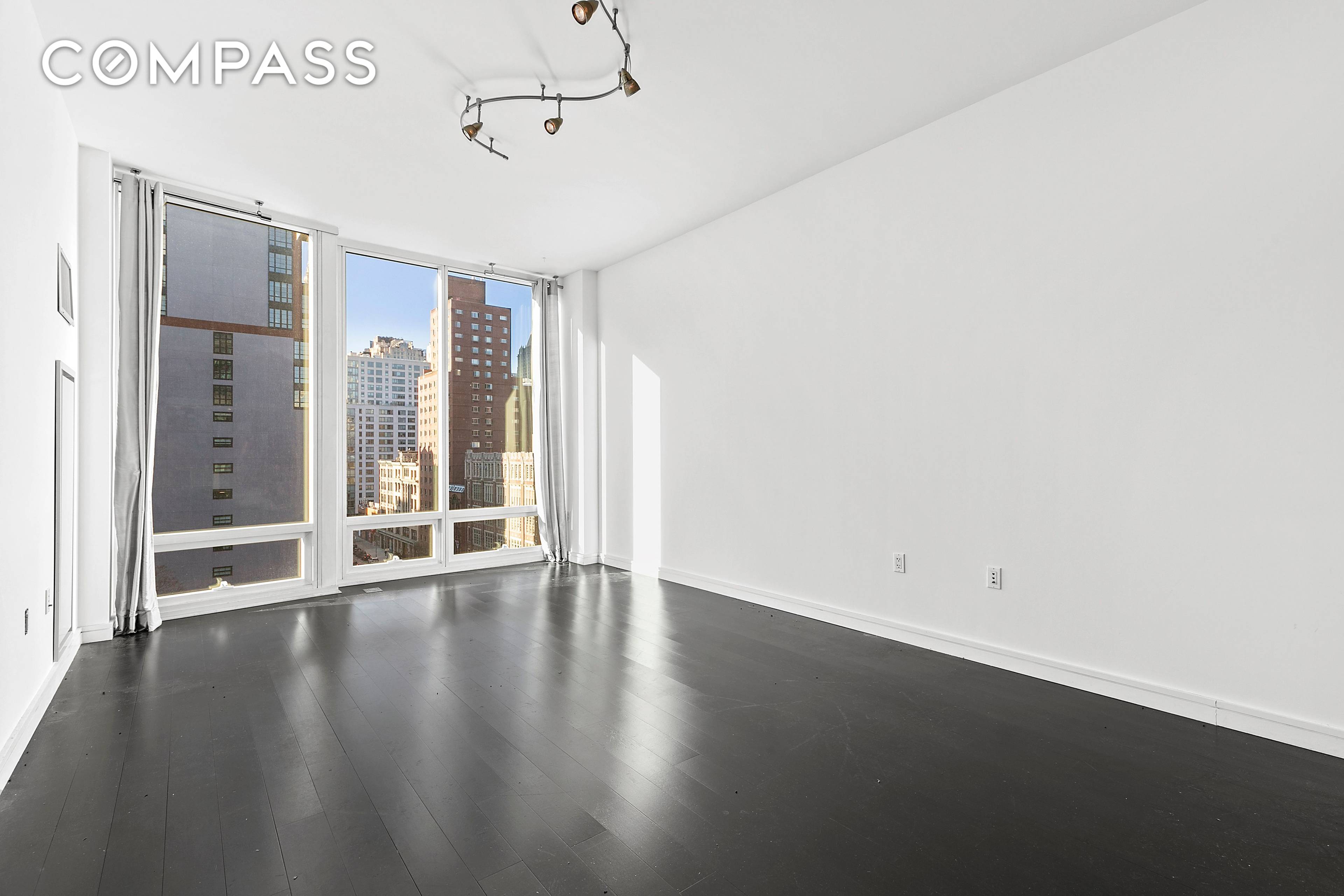 UNIT IS BEING SOLD WITH TENANT IN PLACE Live in one of the city s most glamorous neighborhoods !
