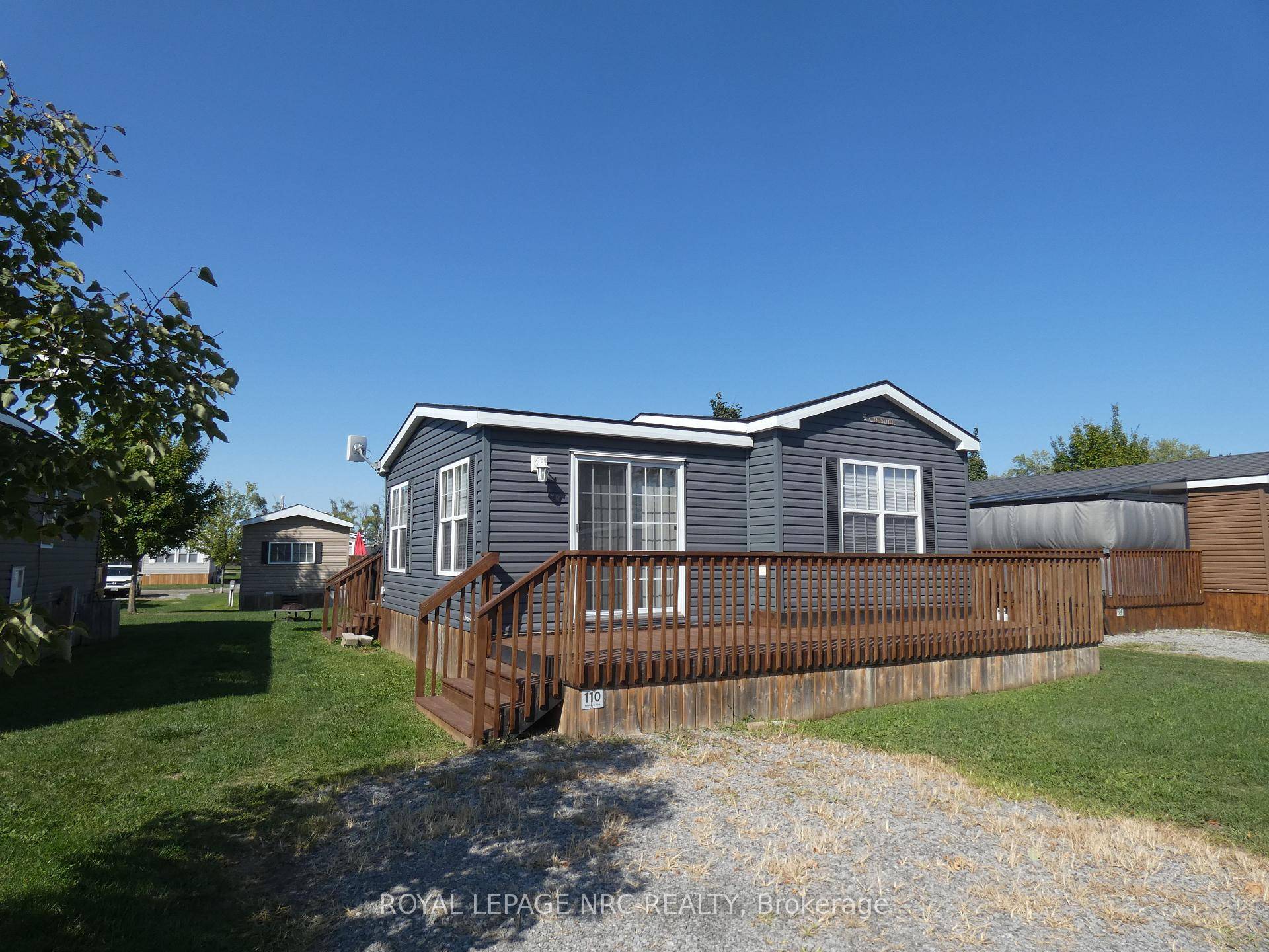 Well maintained 2 bedroom, 1 bathroom summer retreat, ideally situated within the serene Vine Ridge Resort in picturesque Niagara on the Lake.