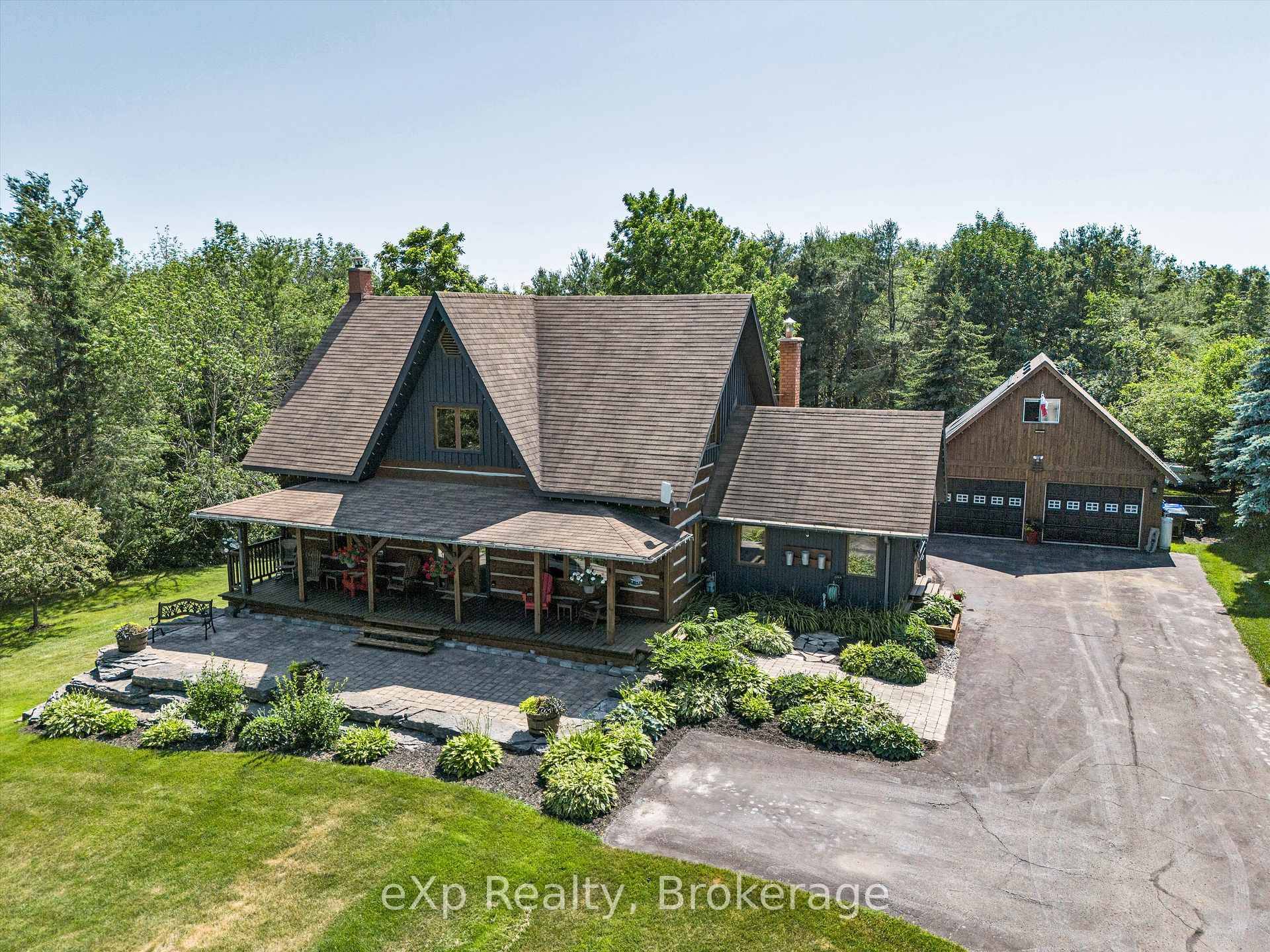 Welcome to this one of a kind, Hutley built custom log home, nestled on a serene and park like country lot just minutes from Shanty Bay and Heritage Hills Golf ...