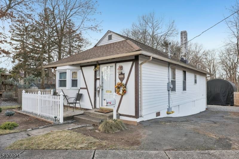 Welcome to this cozy Ranch style cottage offering comfort, convenience and charming curb appeal.