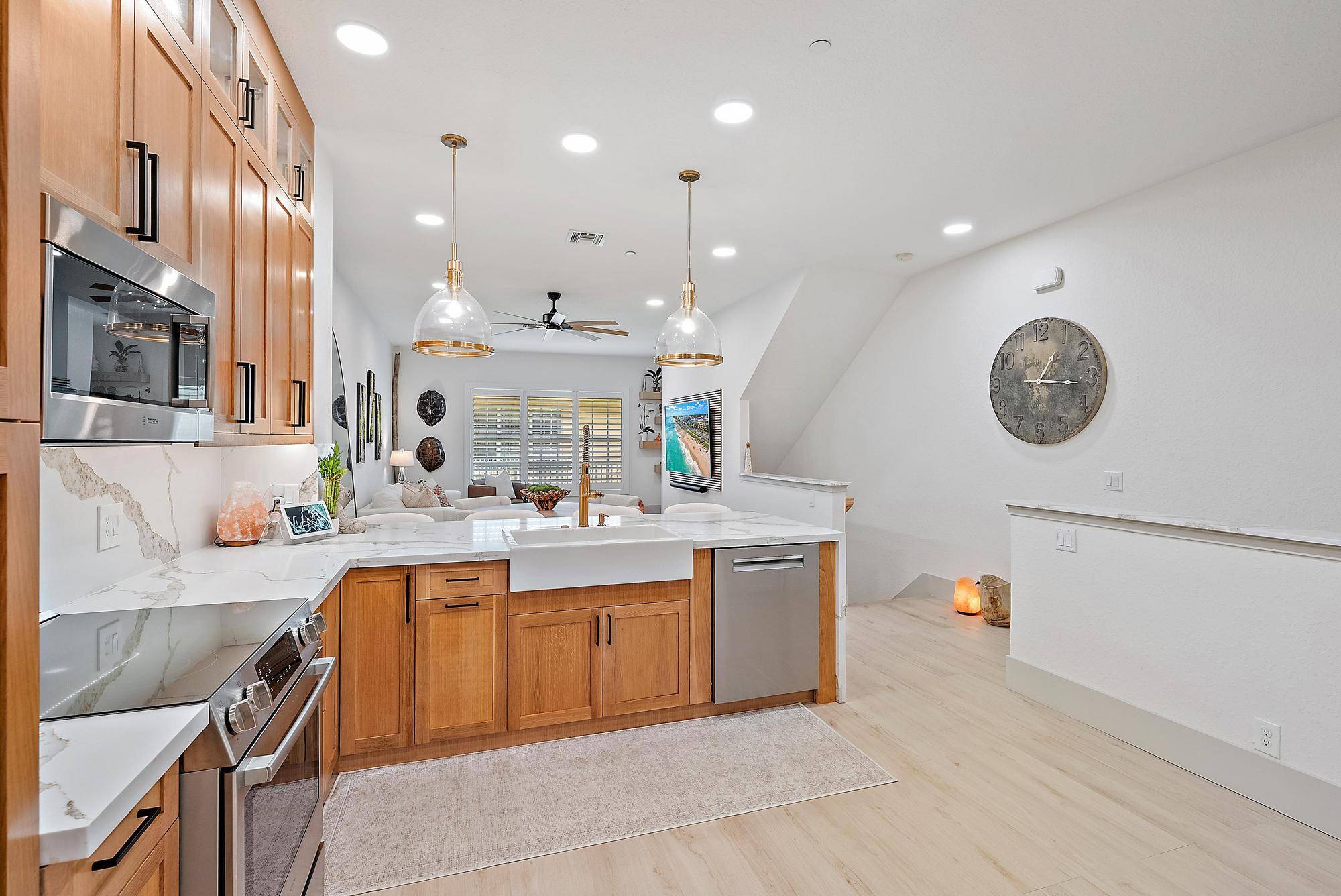 Step into a townhome like no other where clean, contemporary elegance meets warm, inviting design.