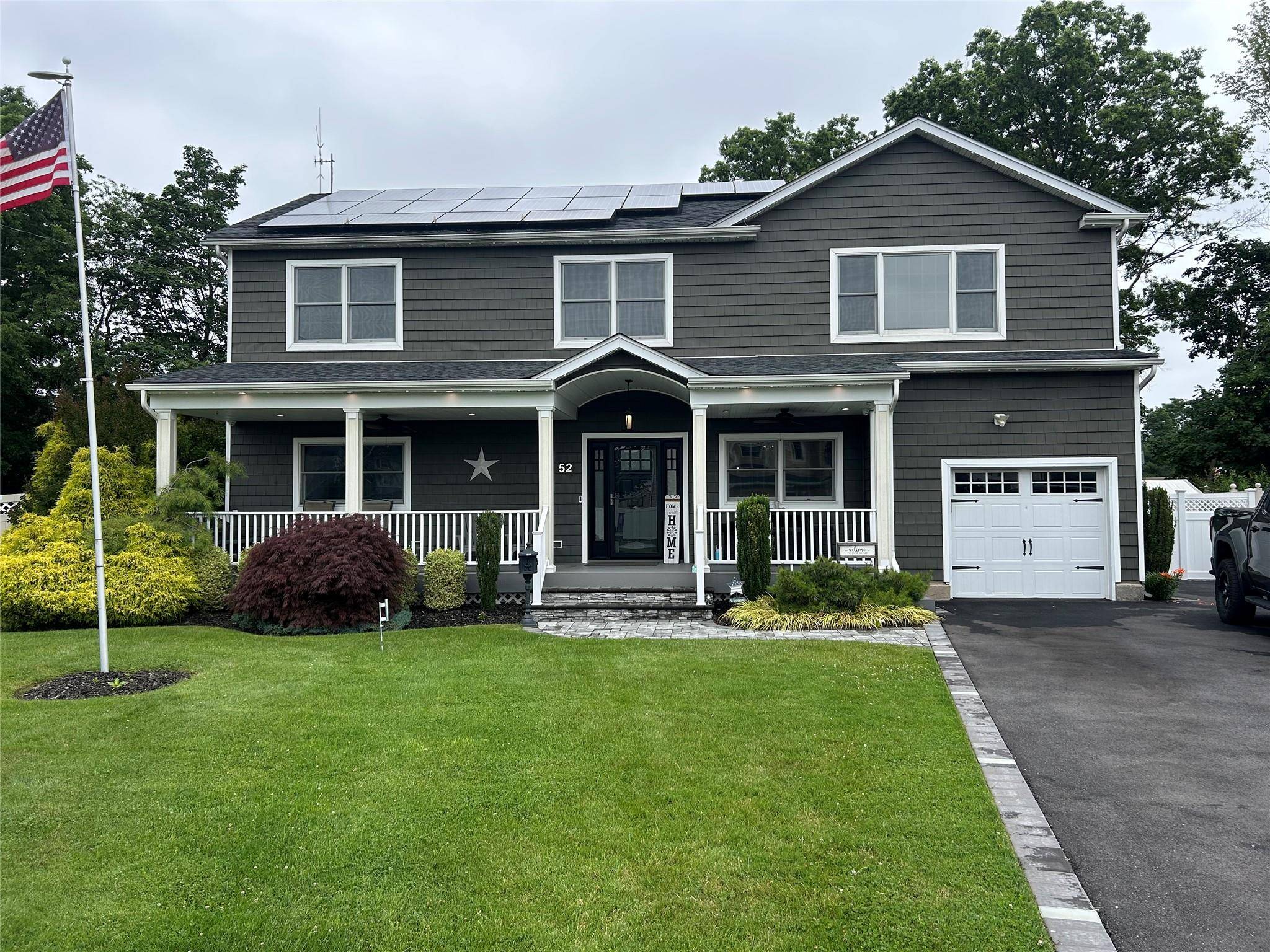 Welcome to this beautifully maintained 4 bedroom, 4 bath Colonial home nestled in sought after Bethpage.