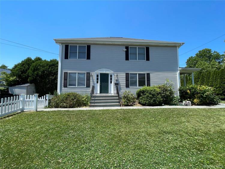 Side by side duplex townhouse style with 3 full floors of living space.