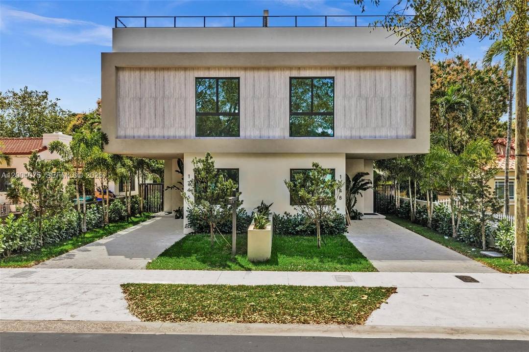 New construction townhome showcasing contemporary design and high end finishes throughout.