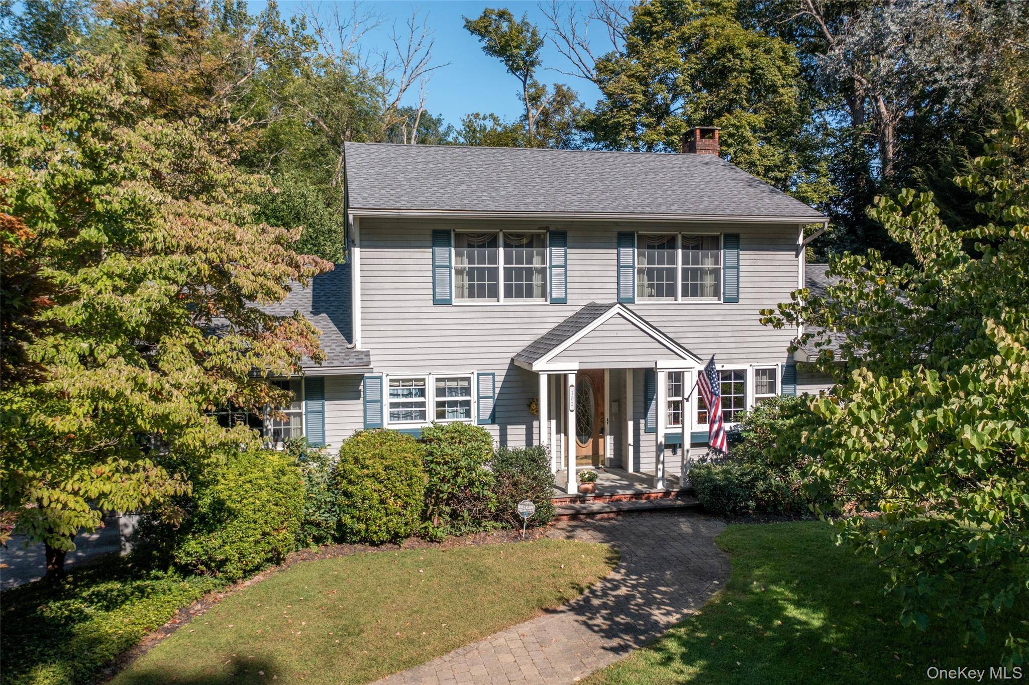 This charming colonial style home, built in 1970s, is nestled in the heart of Pleasant Valley, exuding timeless elegance and classic appeal.