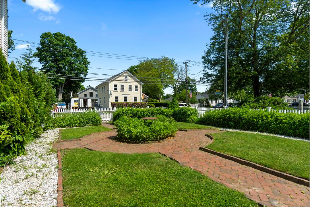 A Rare Mixed Use Offering with River Access in the Heart of Old Lyme Village.