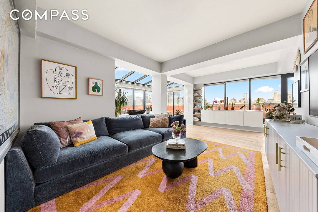 Breathtaking 360 degree skyline views await you in this sun drenched 3 bedroom, 2 bathroom gem, complete with a massive 1900 SQFT private roof deck and deeded parking a true ...