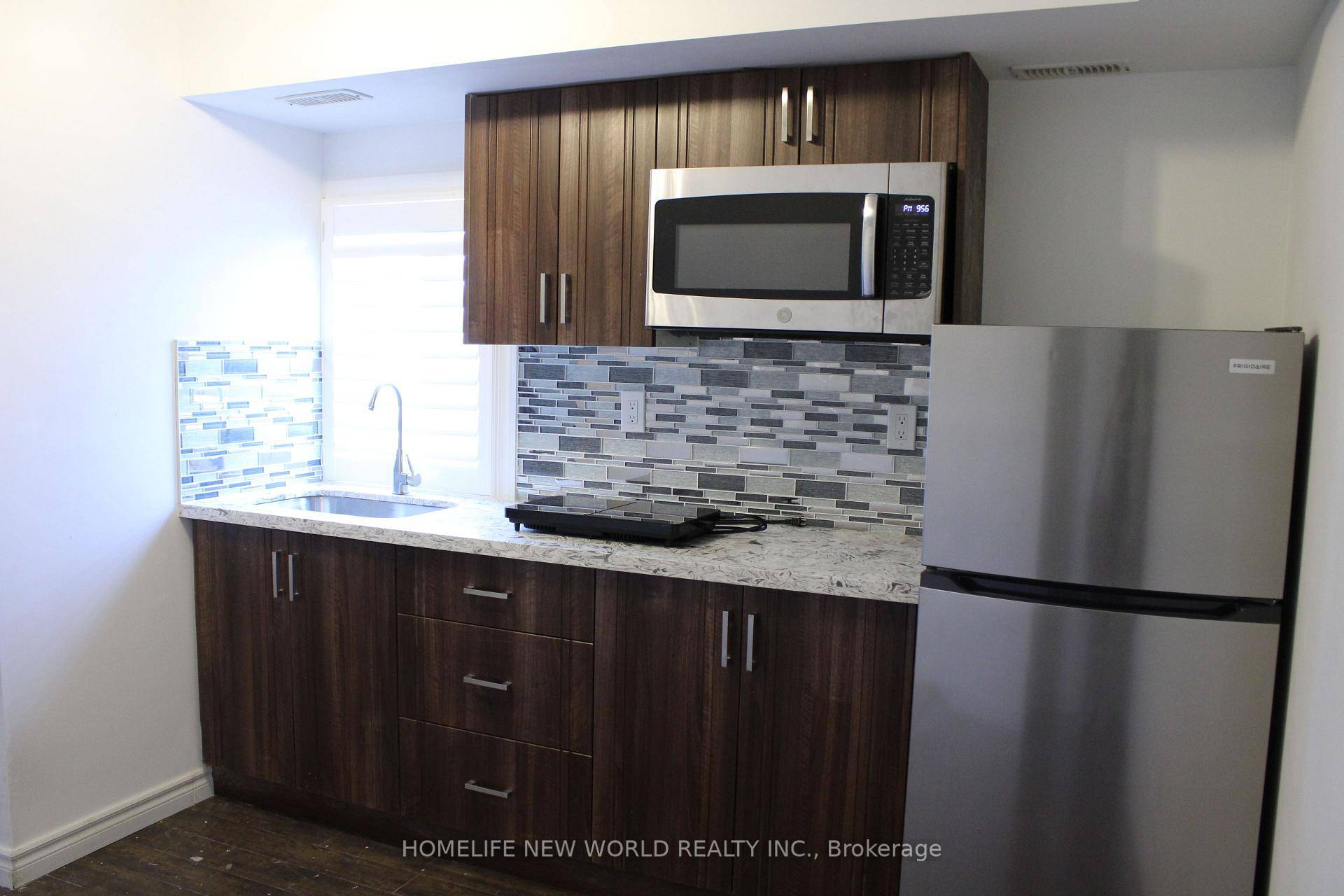A bachelor on Third floor with own Bathroom and Kitchen For Lease, Share Laundry.