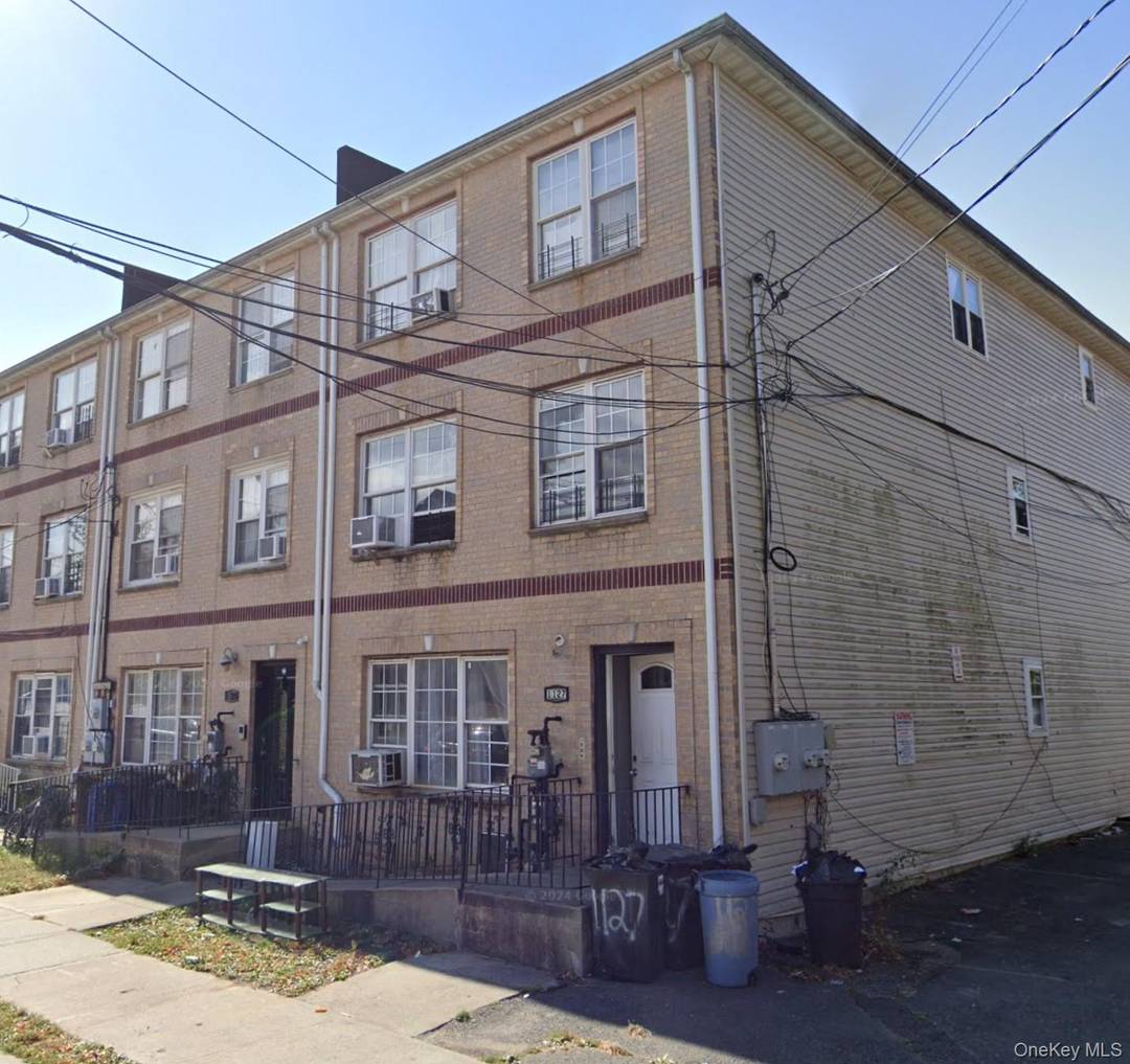 Spacious three bedroom one bath apartment on the second floor with about 1000sf Wildwood flowing throughout a large living room, dining room area, wood kitchen cabinet with countertop and new ...