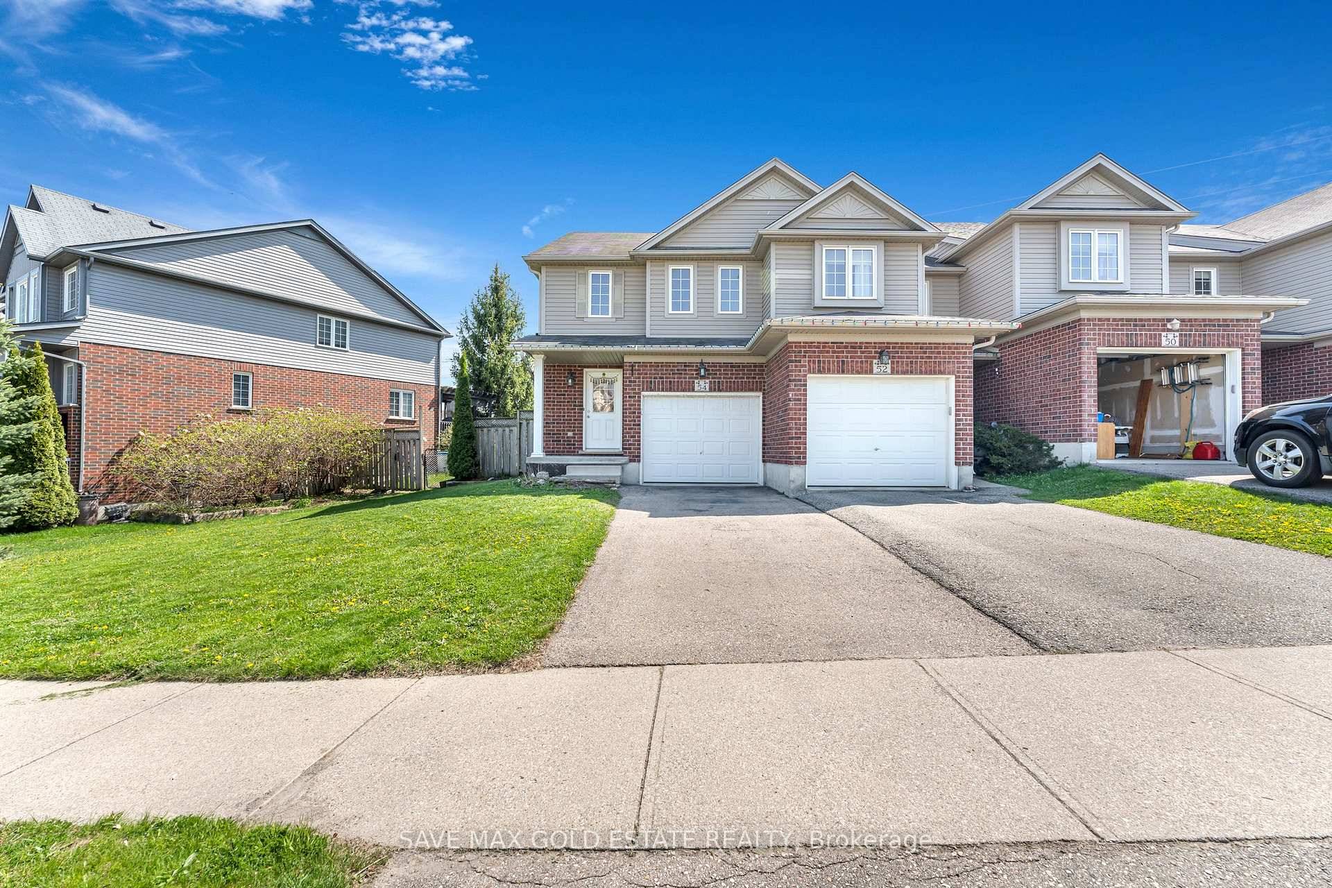 Stylish, Move In Ready End Unit Townhome in Sought After Huron Village !